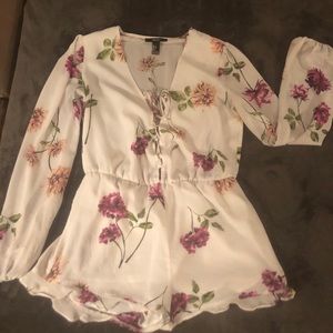 White long sleeved floral romper